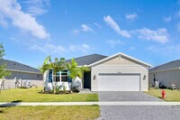 Building Photo - 8990 Dahlia Cir