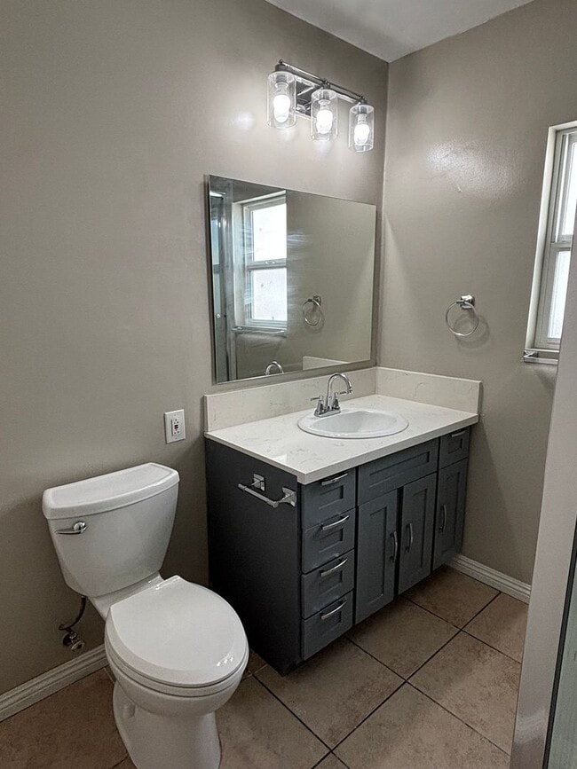 Building Photo - Cozy, Updated, and Pet-Friendly — Your New...