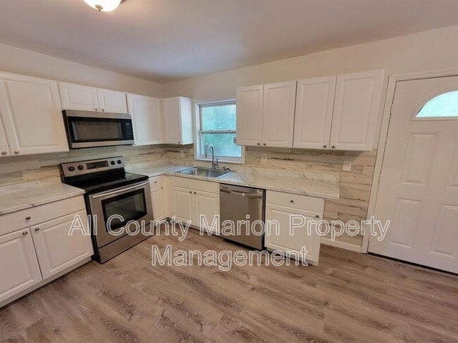 Building Photo - 1140 NW 20th Ave