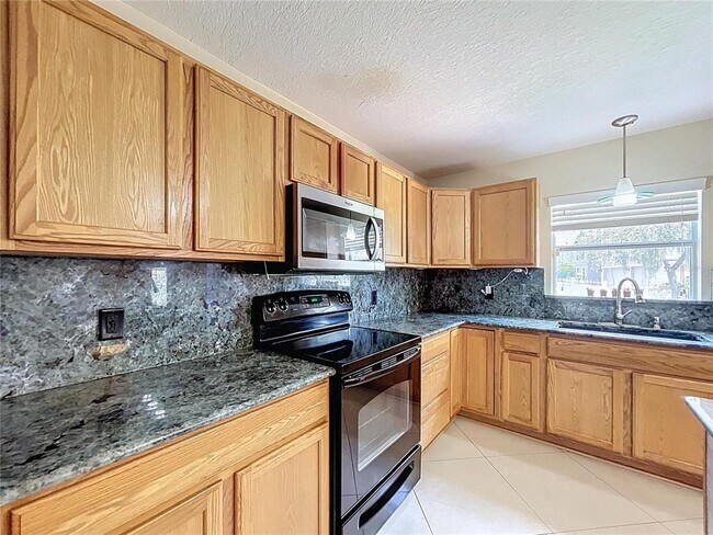Building Photo - 5060 Spanish Oaks Blvd