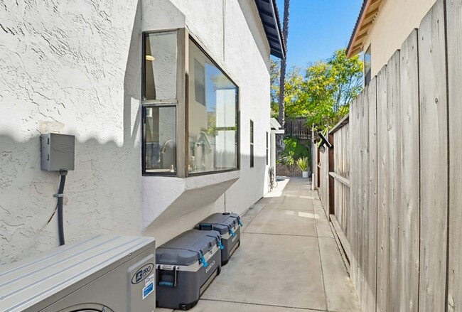 Building Photo - Stunning Upgraded 4BR Home with Pool in Desirable Rancho San Diego – Move-In Ready