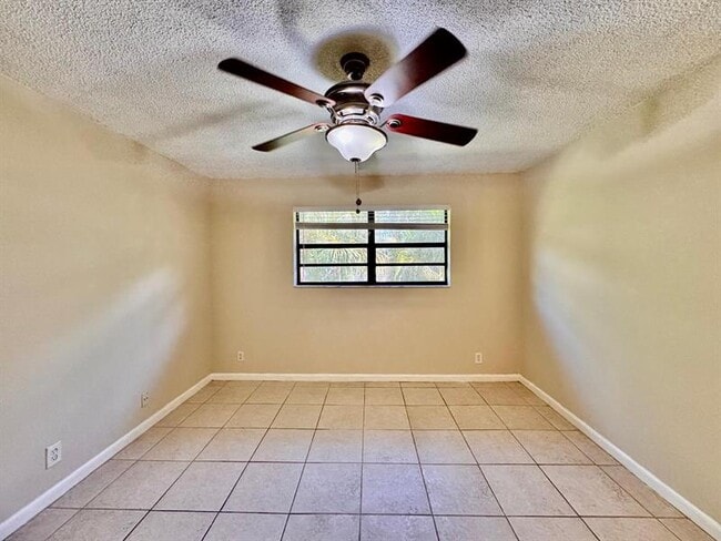 Building Photo - 11211 Royal Palm Blvd