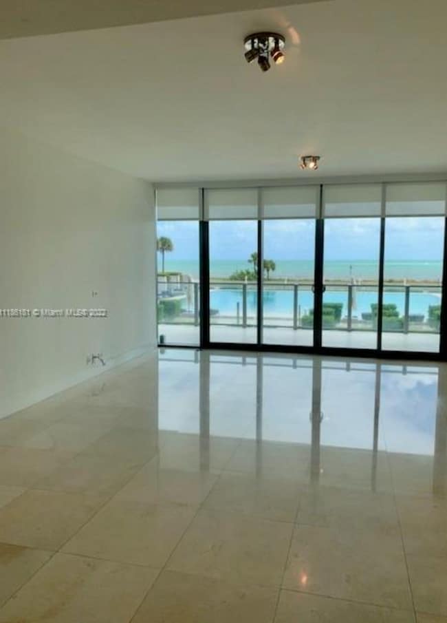 Building Photo - Stunning 2-Bed, 3-Bath + Den with Ocean Vi...