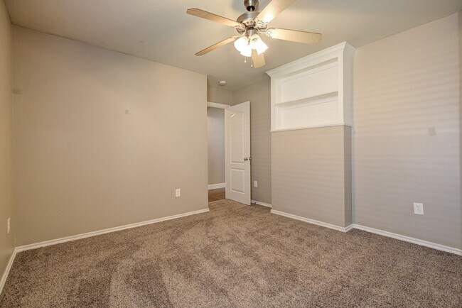 Building Photo - Spacious 4-Bedroom Home with Modern Upgrad...