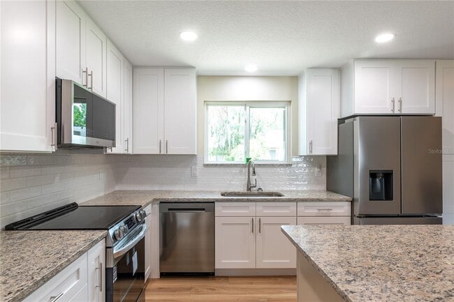 Building Photo - 10886 SW 90th Terrace