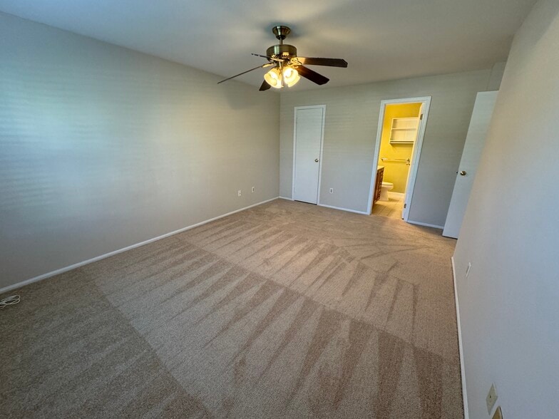 Primary bedroom with walk-in closet and en suite bathroom - 2103 Society Pl