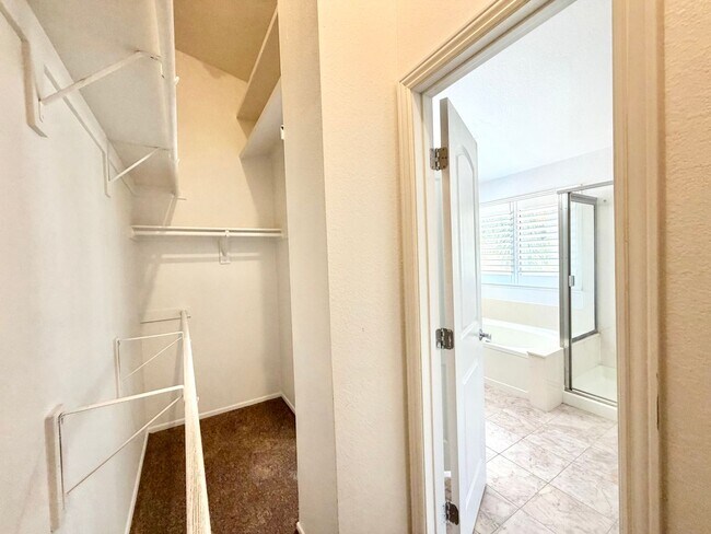 Building Photo - Open-Concept 3 Bedroom 2.5 Bathroom Home with Soaring Ceilings & Spacious Backyard