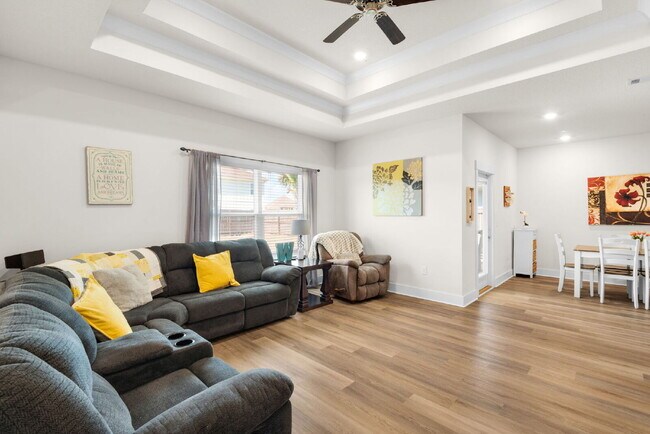 Building Photo - "Charming 4-Bed Oasis with Granite Touches in Gulf Breeze – Solar Panels !"