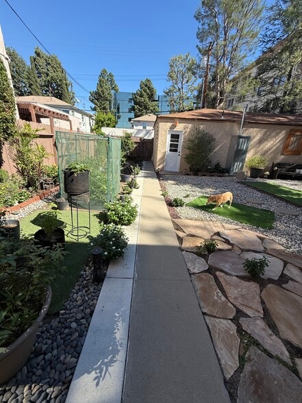 Laundry room/Back yard - 114 1/2 N Pass Ave