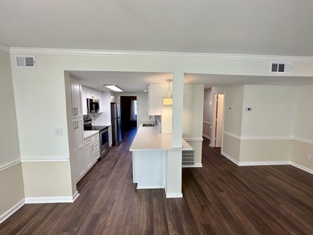View from living to kitchen & hallway - 25 Ivy Sq NE