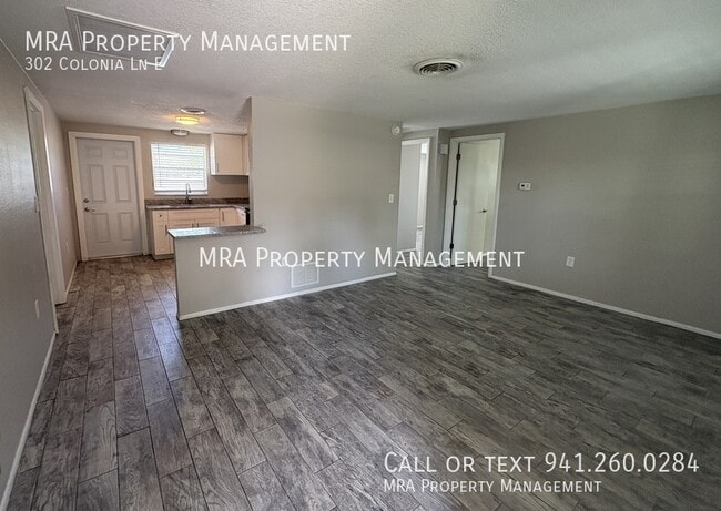 Building Photo - 302 Colonia Ln E