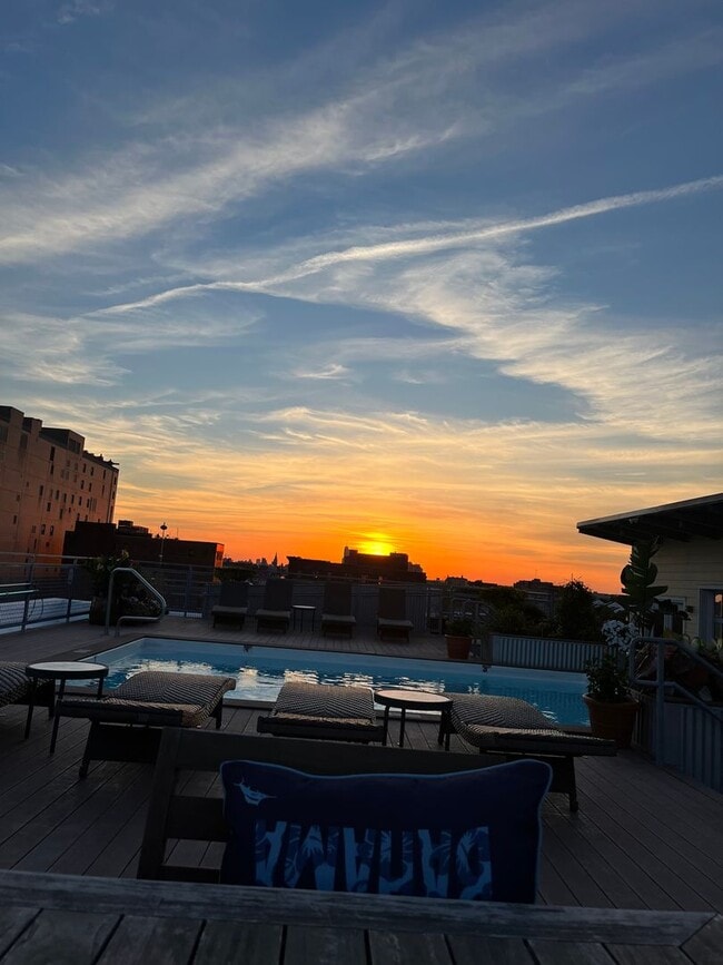 Building Photo - Beautiful 2-bedroom loft with garage parking, and community room with swimming pool!