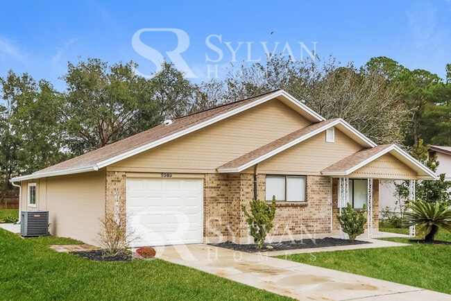 Building Photo - The living is easy in this 3 bedroom, 2 bathroom home!