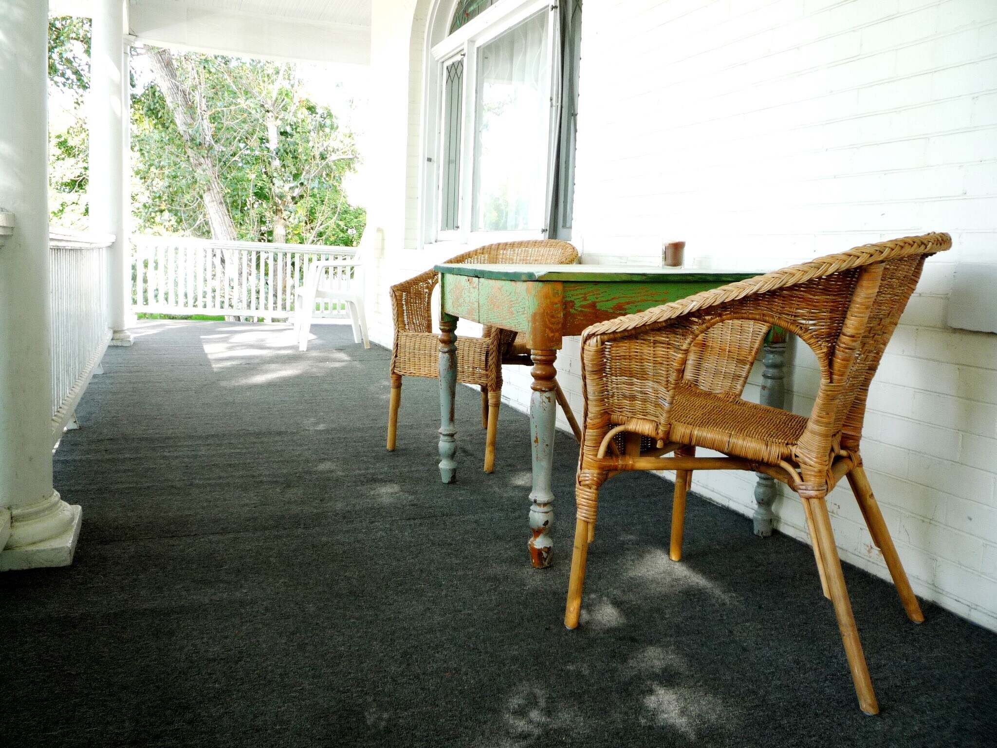 Big wrap-around porch is accessible to all tenants - 851 E 3rd Ave