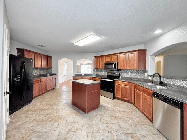 Building Photo - Beautiful 4 Bedroom Home in Inwood Place!