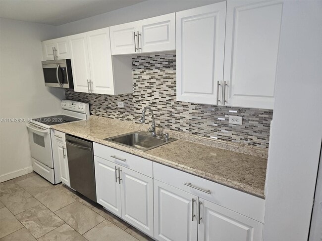 Building Photo - 7135 Collins Ave