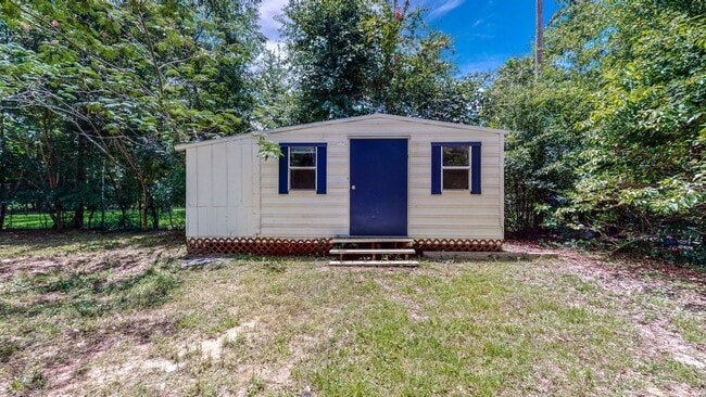Building Photo - Charming Updated Home in Bluewater Bay – N...
