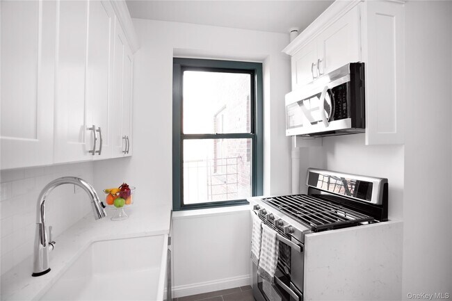 Building Photo - 34-40-40 79th St