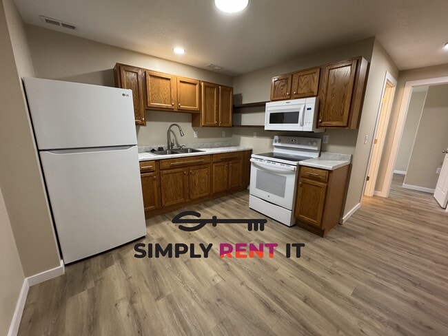 Building Photo - All Utilities, Lower-Level Living Space in Owner Occupied Home