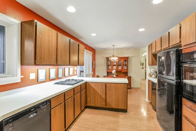 The heart of the house...the kitchen with a new gas Jenn Air stove - 162 Denison Dr