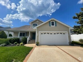 Building Photo - Discover the allure of year-round living i...