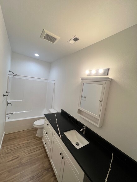 Bathroom off living room and kitchen - 119 Grant Dr