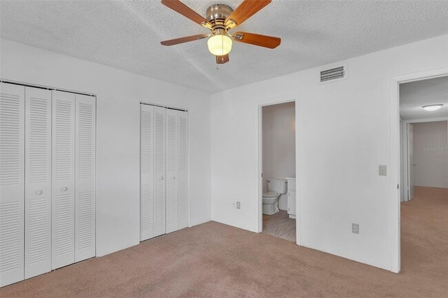 Building Photo - Comfortable & Spacious 3BR Condo with Built-In Closets and Backyard Patio in Tavares Community