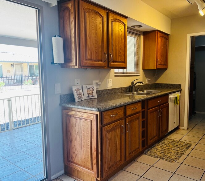 Kitchen leading to back patio - 810 Leisure World