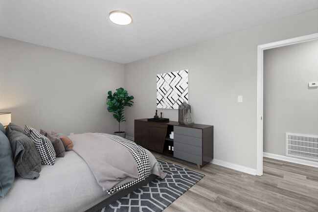 The Holly Master Bed Staged - Cooper's Ranch Apartments is the Place to Call Home!