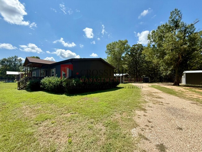 Building Photo - Tour Today! Spacious 4-Bedroom Home with Large Metal Building & Outdoor Kitchen