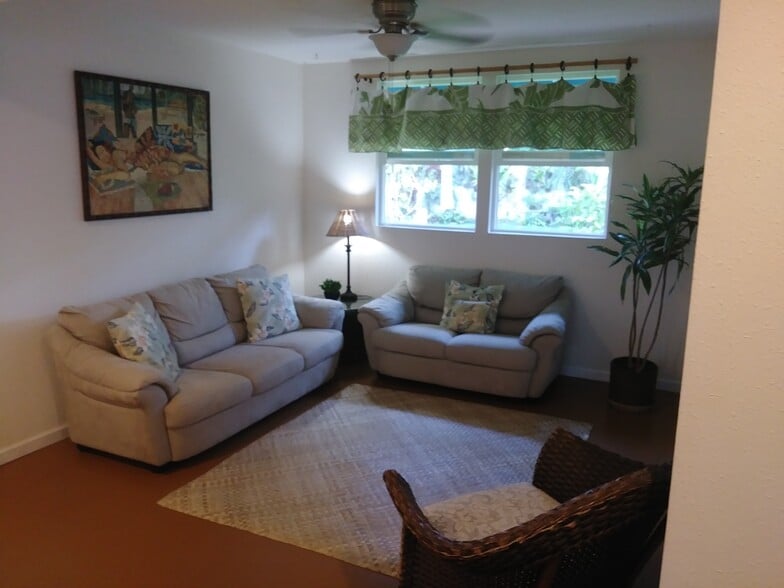 Ground level bedroom staged as living room - 329 Auwinala Rd