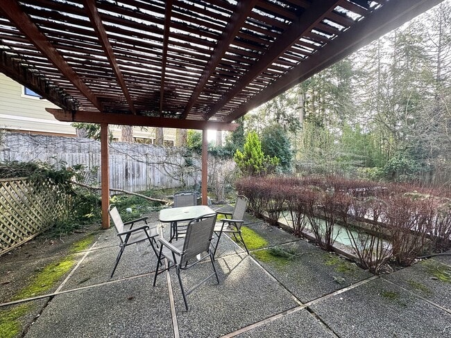 Building Photo - Stunning Bellevue Home with Lush Gardens &...