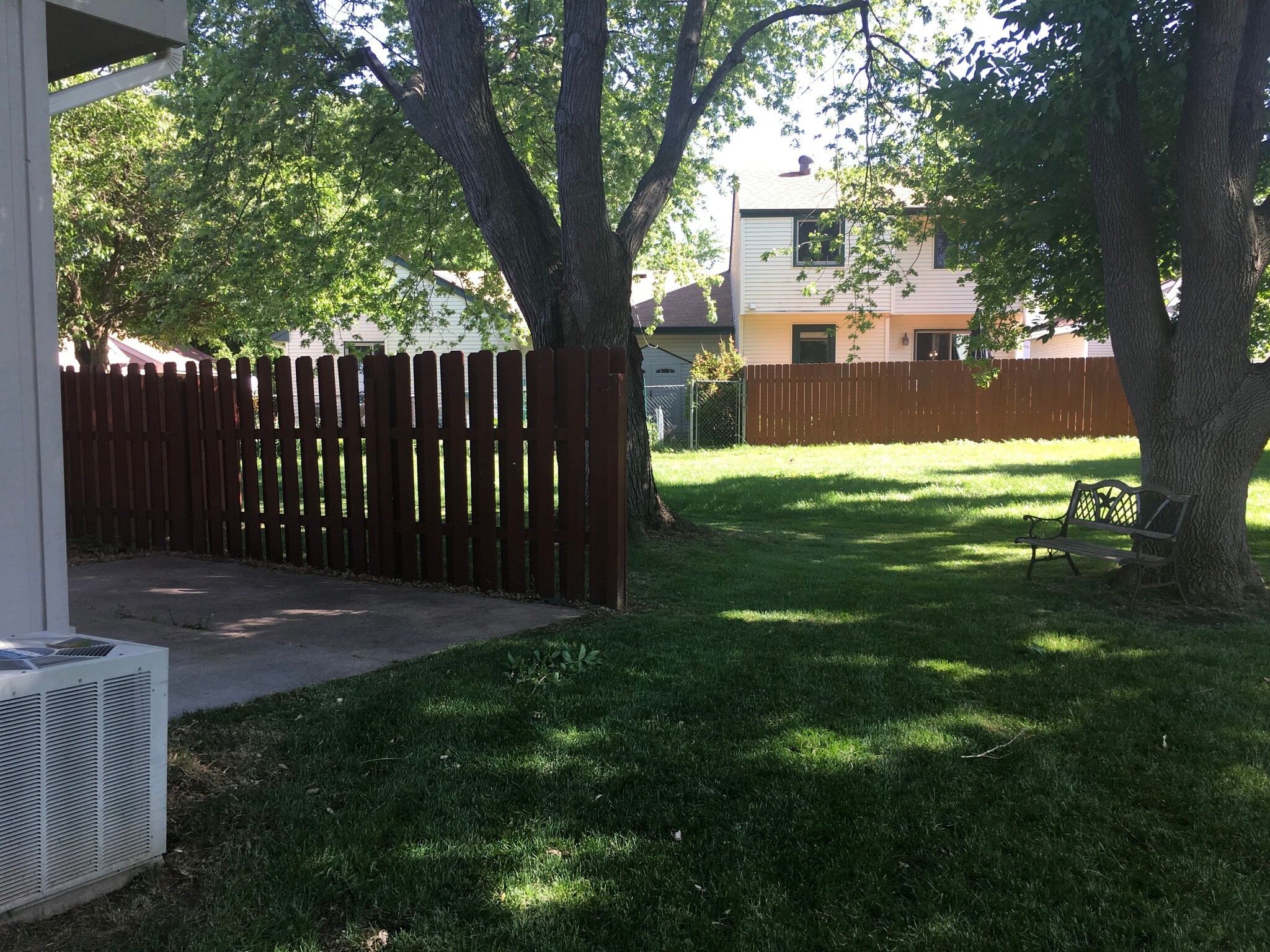 Nice backyard with mature trees. Great place to grill. Also has a small common area behind the yard. - 12063 Burdette Cir