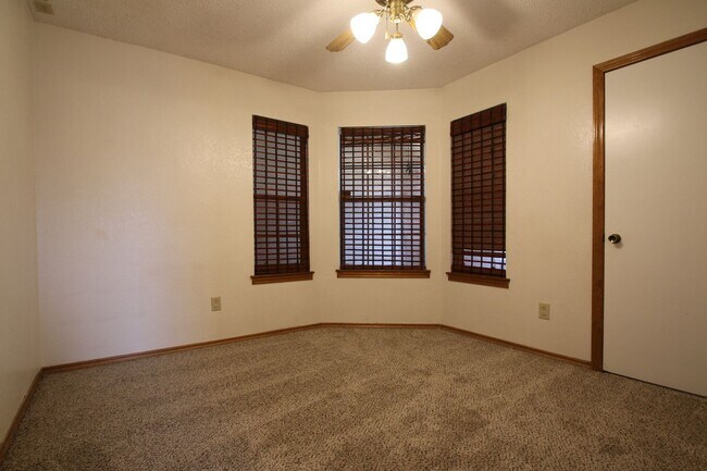 Building Photo - Corner Lot Charmer Off Chapel Creek | 4BR/2BA with Fireplace, Garden Tub & Fenced Backyard