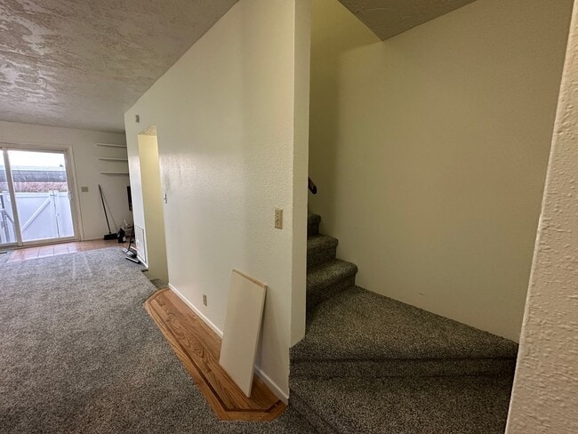 Building Photo - Spacious, three level, 4 Bed 2.5 bath Townhome in Ammon right behind the Walmart on Hitt.