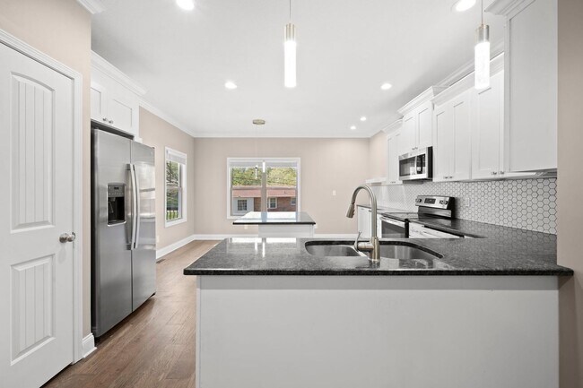 Building Photo - Move-In Special Available! Beautiful 4BR Home with Finished Basement