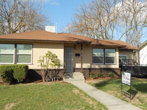 Building Photo - Central North home with big backyard, dual pane windows & more!