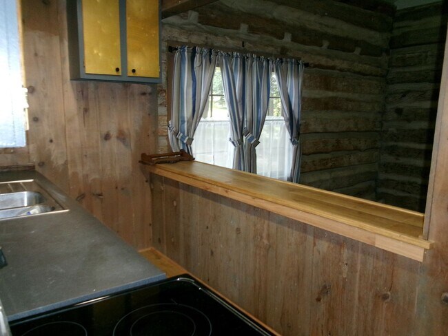 Building Photo - FOR RENT-Rustic log cabin home for RENT in...