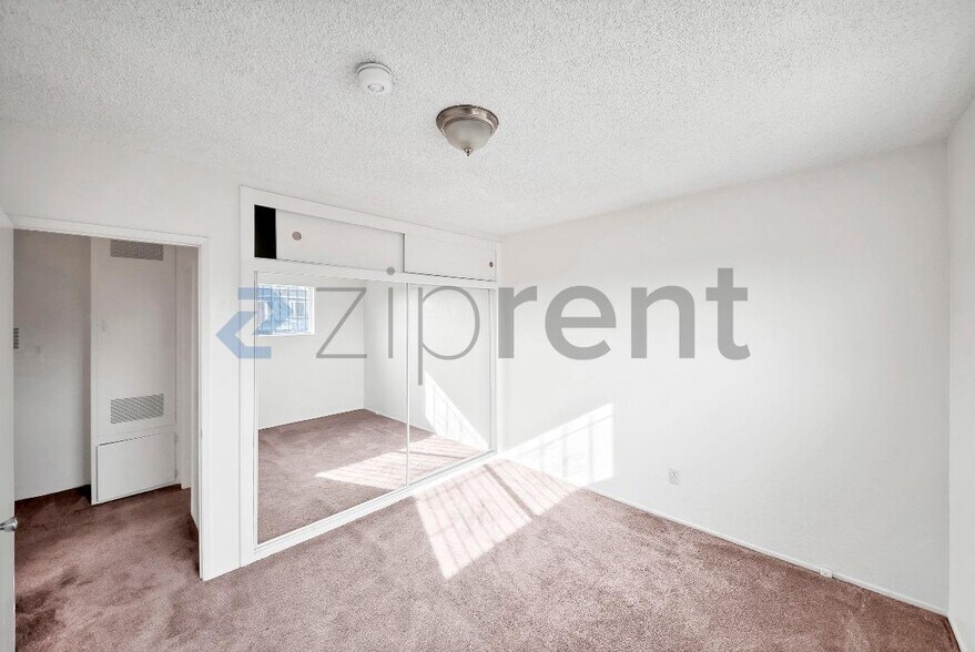 Building Photo - 2458 Normandie Ave