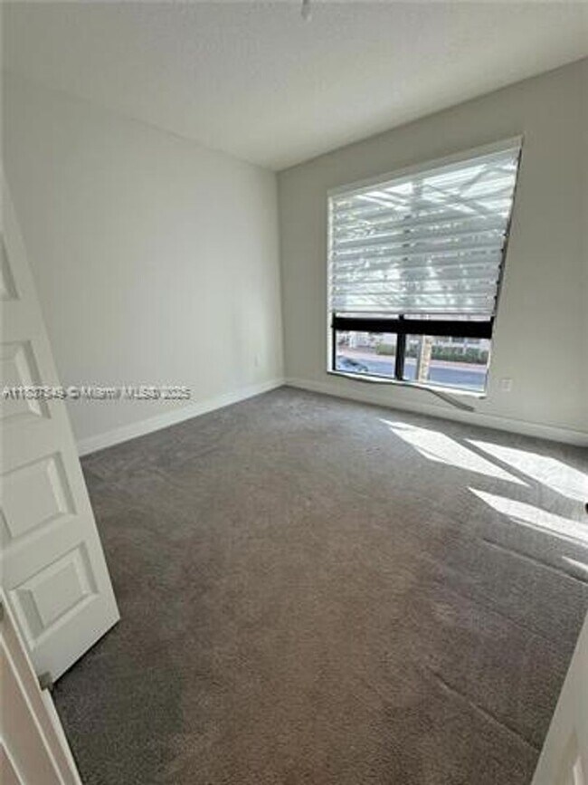 Building Photo - 4670 NW 84th Ave