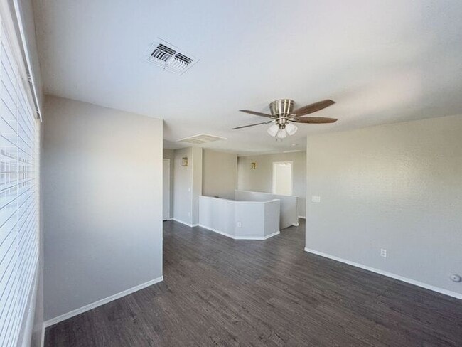 Building Photo - 4BR / 2.5BA Home with Expansive Lot – 2-Car Garage, Community Pools & Golf