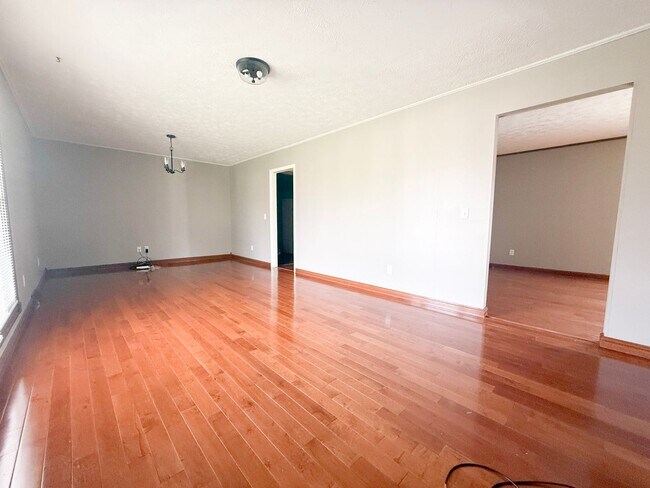 Building Photo - Spacious 3-Bedroom Home with Huge Yard, Covered Porches & Storage Building