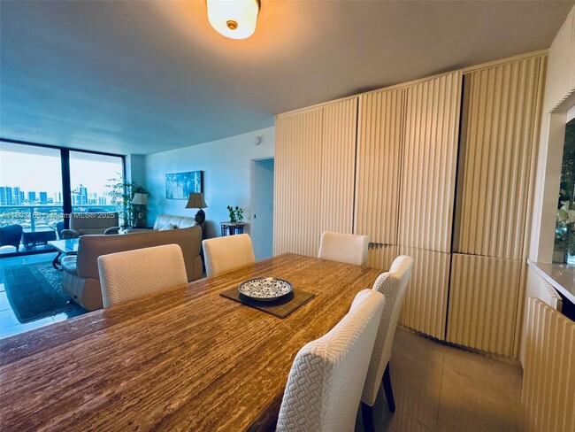 Building Photo - 3675 N Country Club Dr