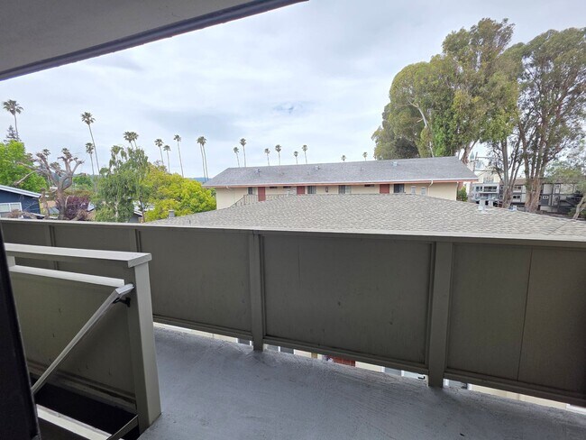 Building Photo - Spacious 2BR Condo with Central A/C, Bonus Room & Huge Storage – Walk to Burlingame Avenue