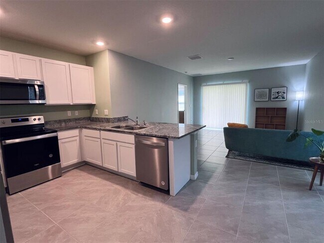 Building Photo - 5563 Birch River Trl