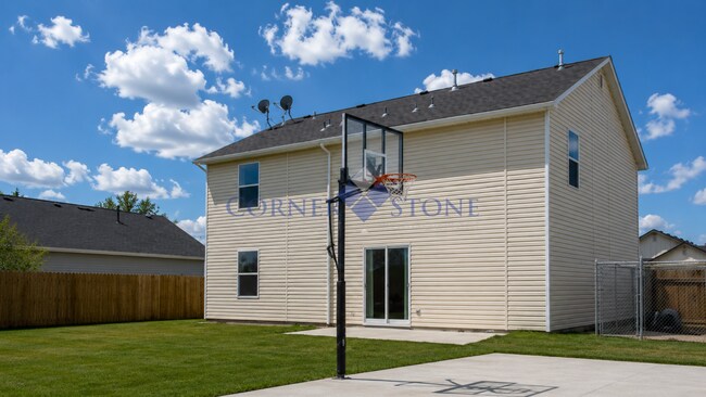 Building Photo - Large 4 Bedroom Home with Garden space, Basketball Court, Close to park!