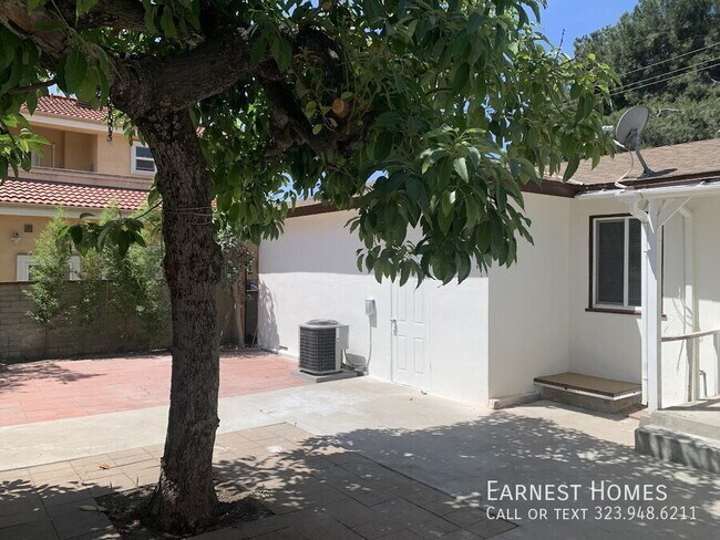 Building Photo - 9802 E Camino Real Ave