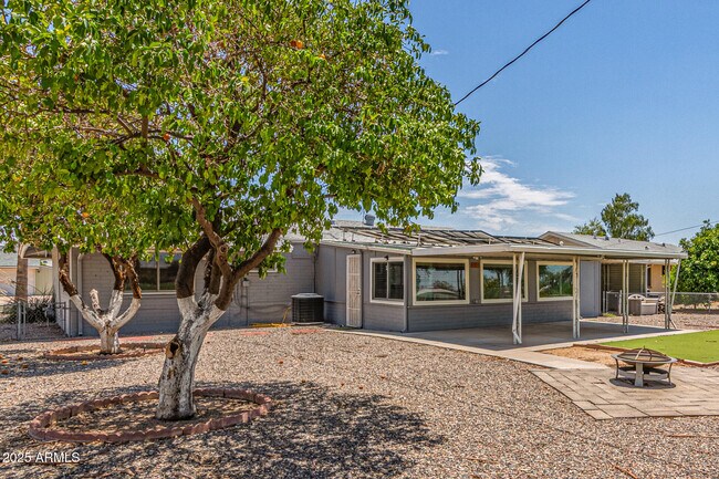 Building Photo - 12640 N Pebble Beach Dr