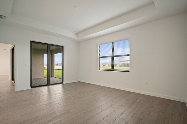 Building Photo - NEW CONSTRUCTION 3beds+Den 3 baths located...
