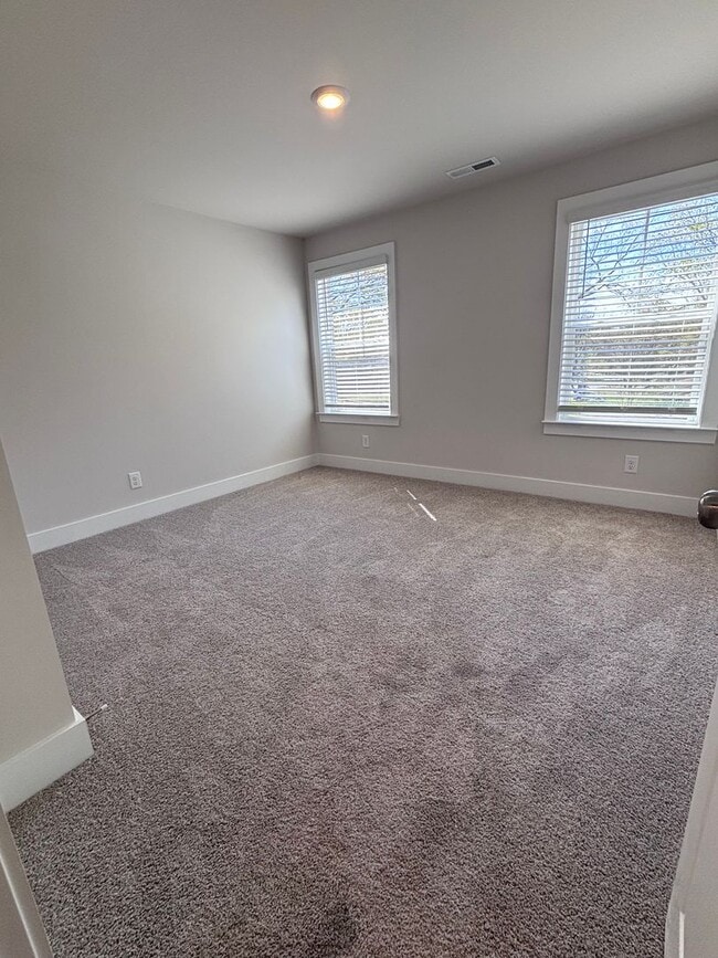 Building Photo - Brand new three-bedroom, 2.5-bath townhome